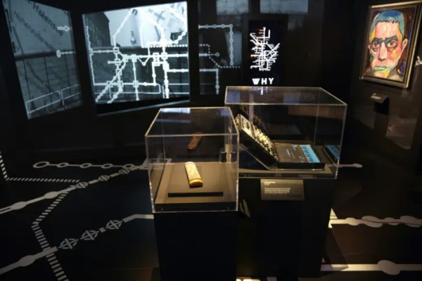 Collage of vinyl records that are printed in colorful spiral patterns