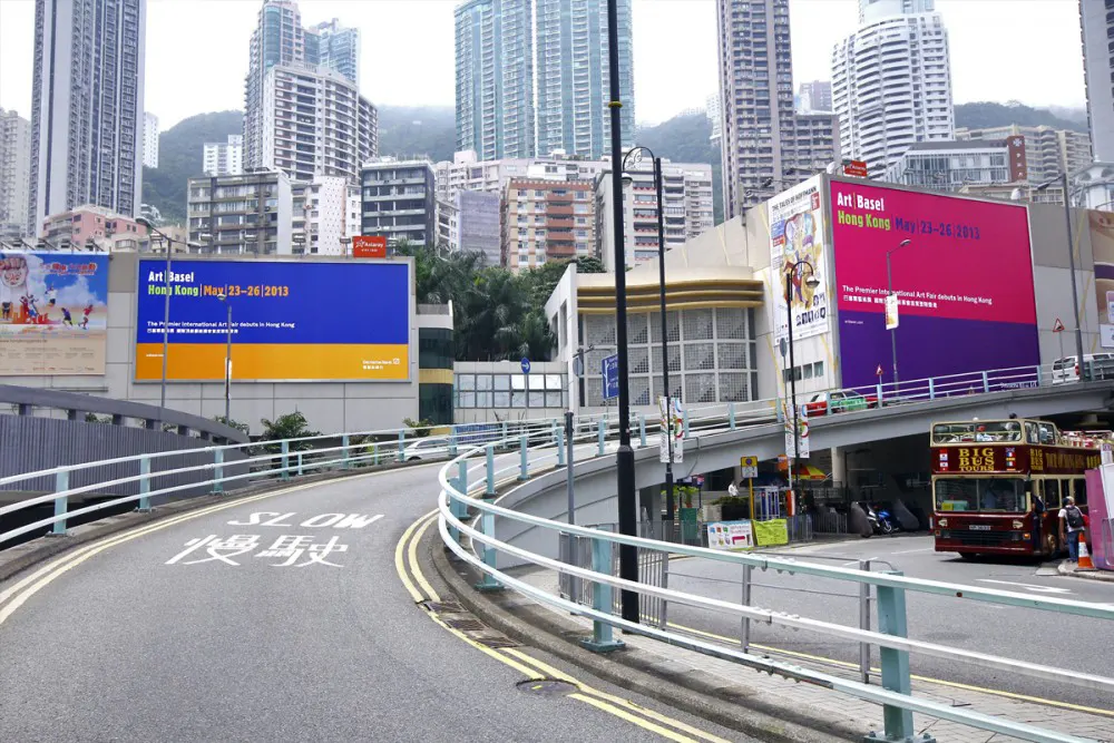 Designer standing at desk working on design of Jimmy Dean Griddle bags